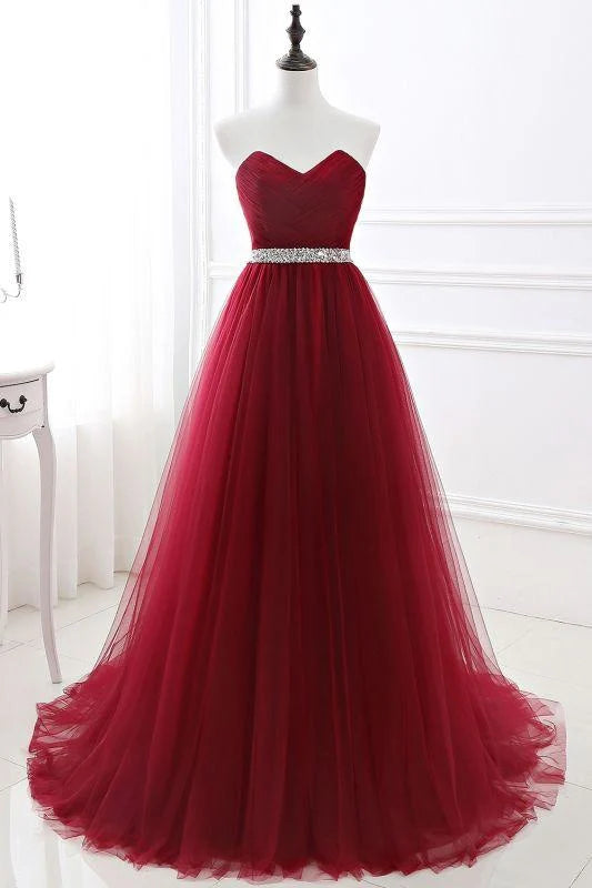 Elegant strapless sweetheart tulle prom dress with lace-up back.