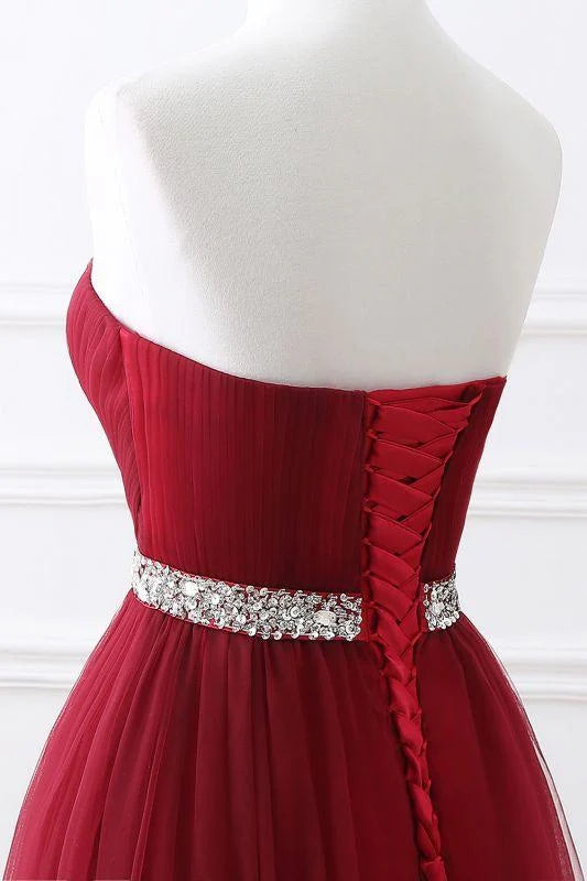 Flowing tulle skirt of a formal evening gown.