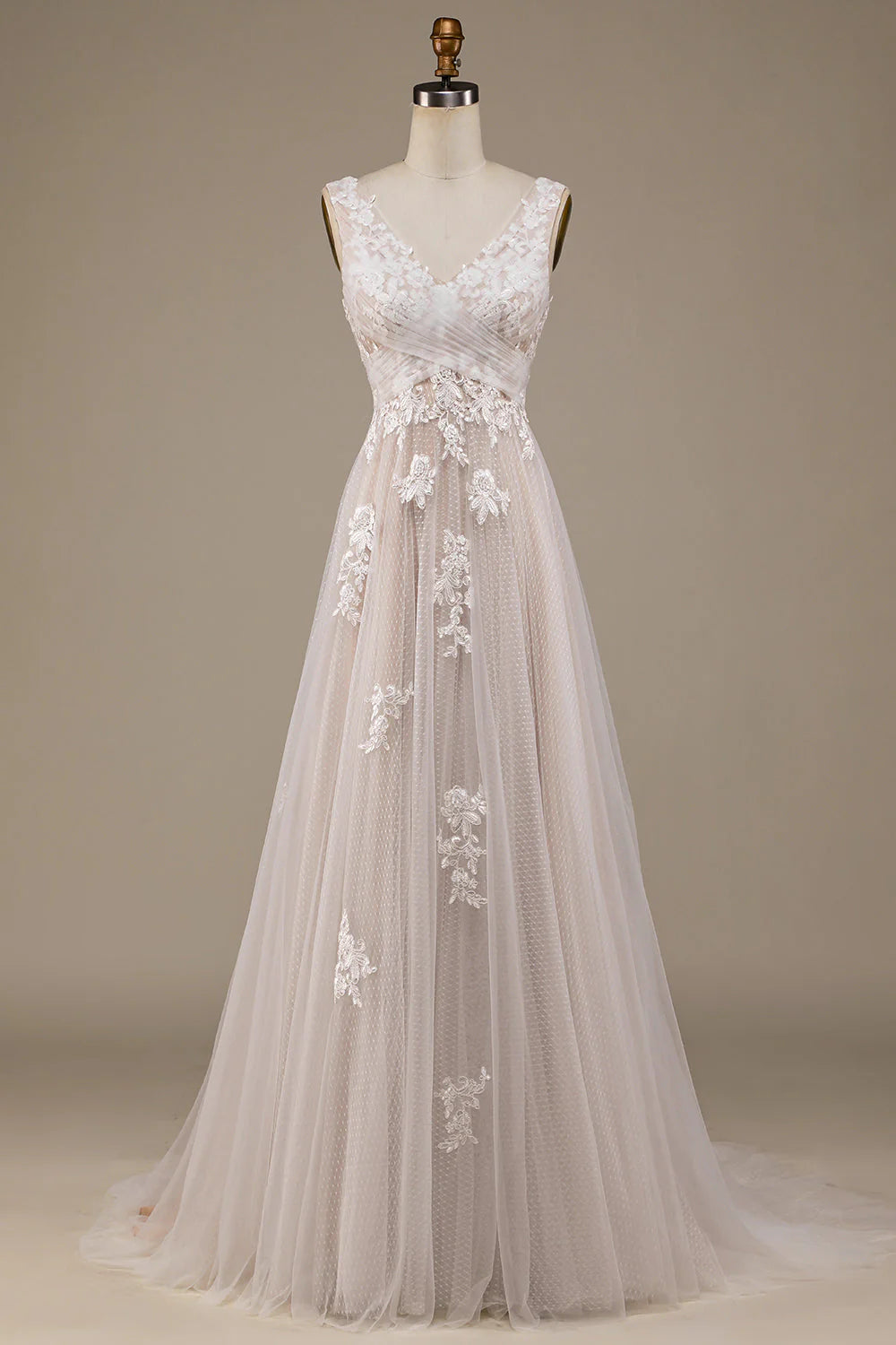 Elegant strapless tulle and lace wedding dress with a sweetheart neckline and sweep train.