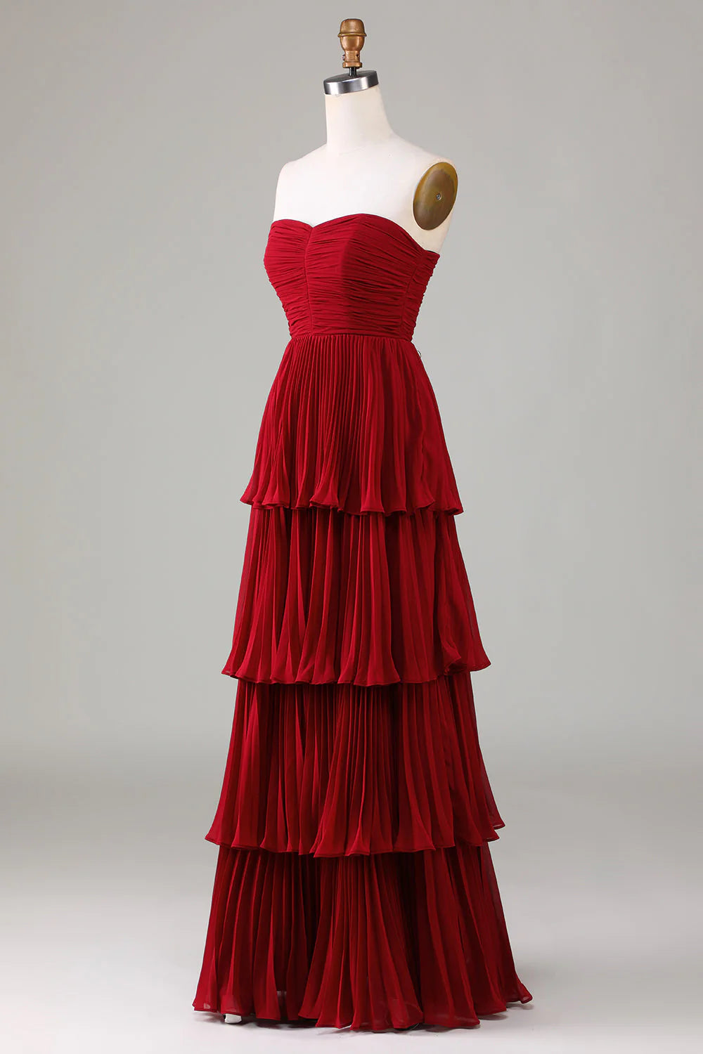 Back view of the strapless tiered long bridesmaid dress.
