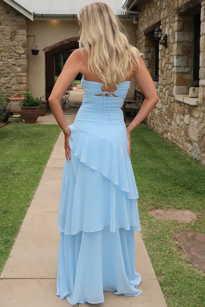 Close-up of the twist-front neckline and cutout detail on the sky blue dress.