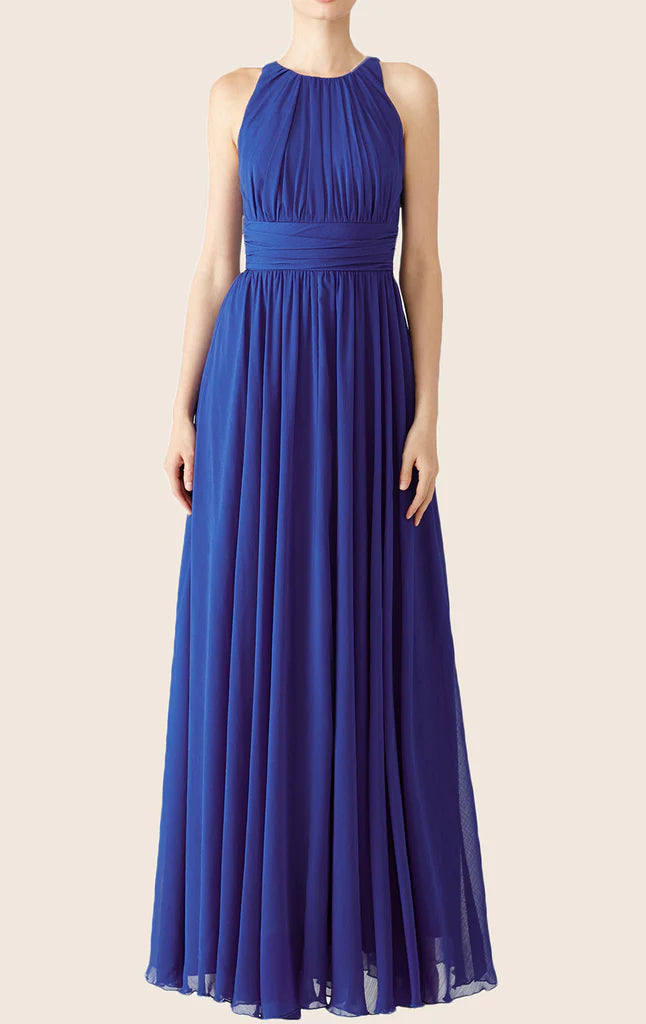 Model wearing an elegant strappy chiffon long formal prom gown.