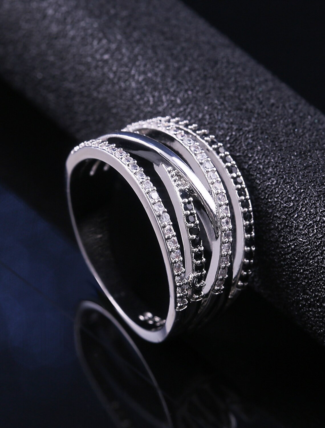 Close-up of a stylish alloy ring with a subtle, intricate design.
