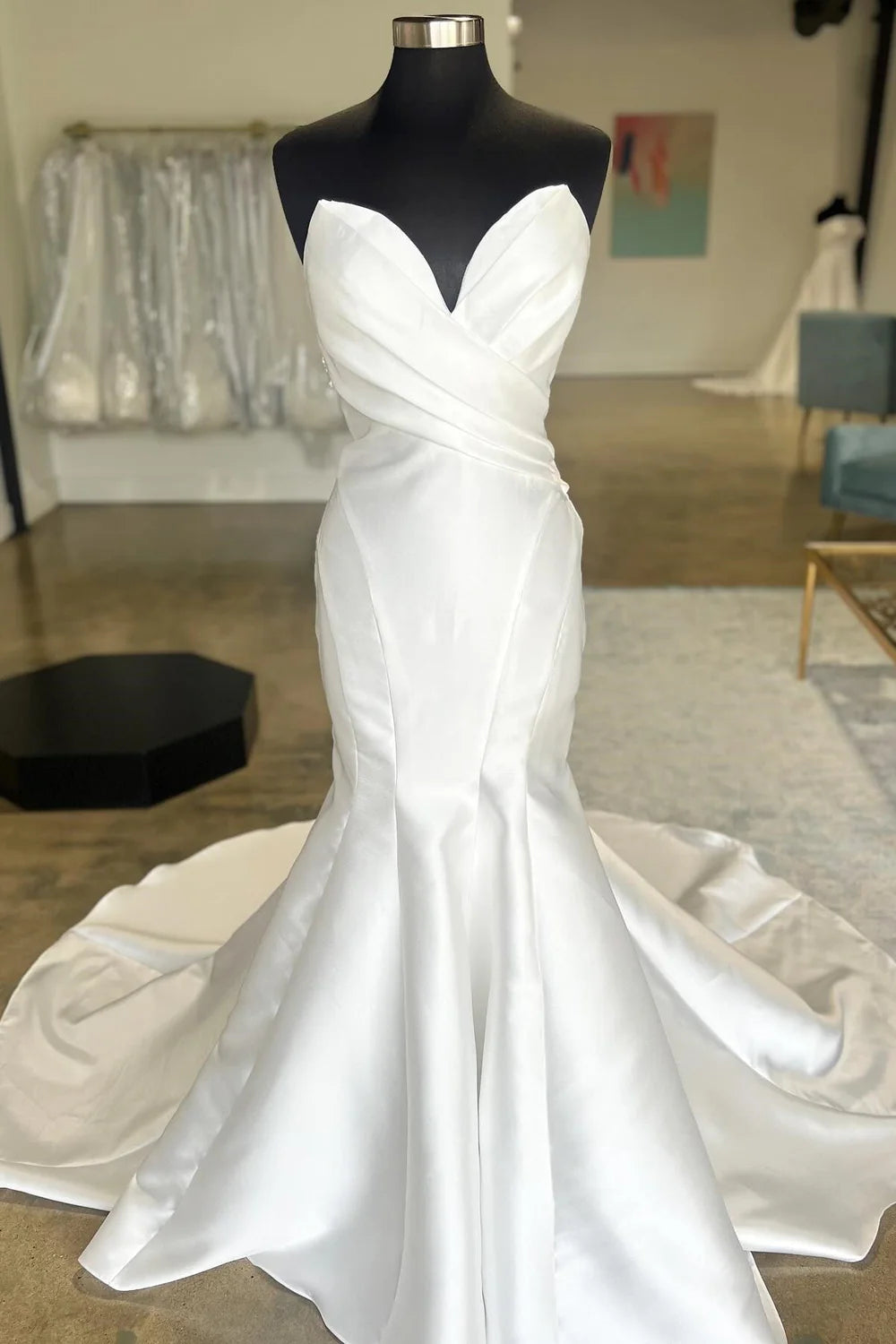 Elegant trumpet wedding dress with surplice neckline.