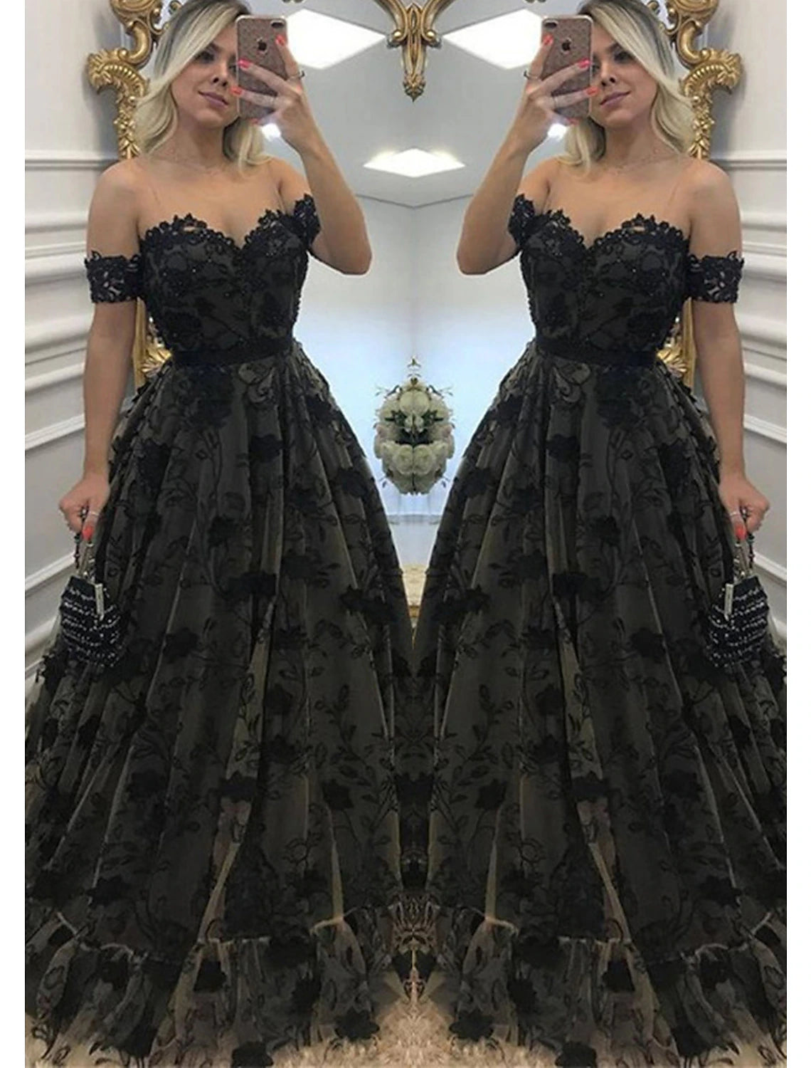 Close-up of the back of the prom dress, showing intricate lace and delicate beading appliques.