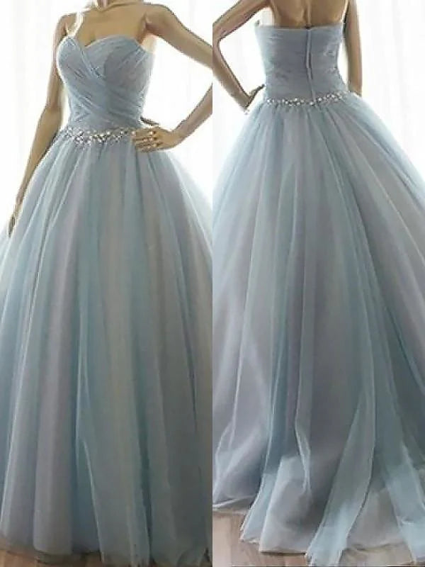 Elegant sweetheart beaded tulle prom dress, front view.