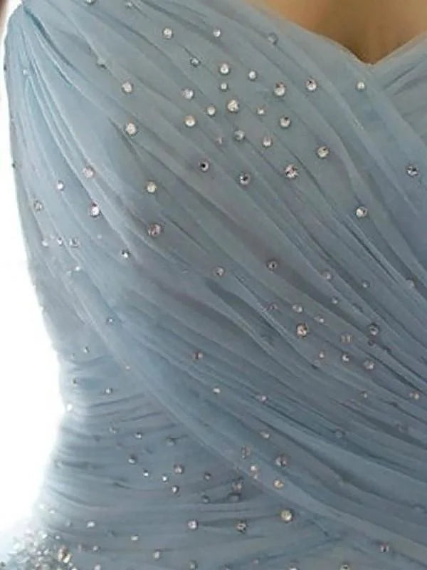 Side view of a floor-length A-line prom dress with sweetheart neckline.