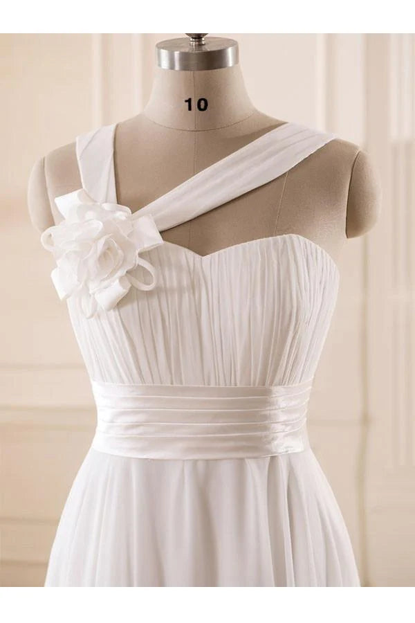 Back view of a flowing maxi chiffon wedding dress with a sweetheart neckline.