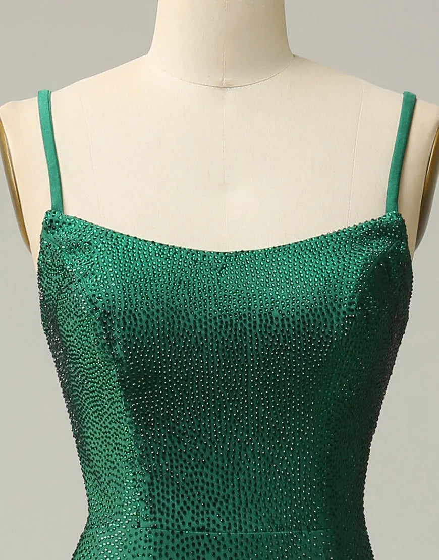 Full length view of dark green formal gown.