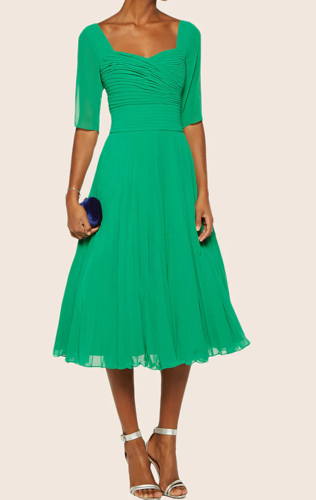 Elegant woman wearing a sweetheart half sleeve chiffon mother of the bride dress.