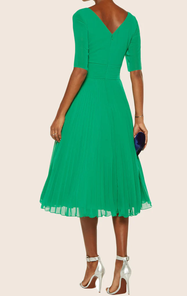 Formal chiffon gown with sweetheart neckline and half sleeves, side view.