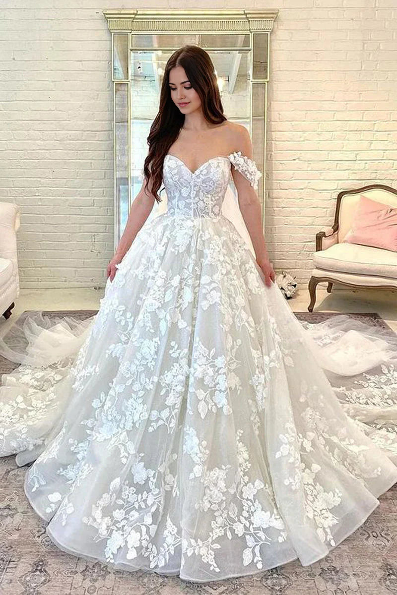 Elegant white sweetheart lace and tulle ball gown wedding dress.