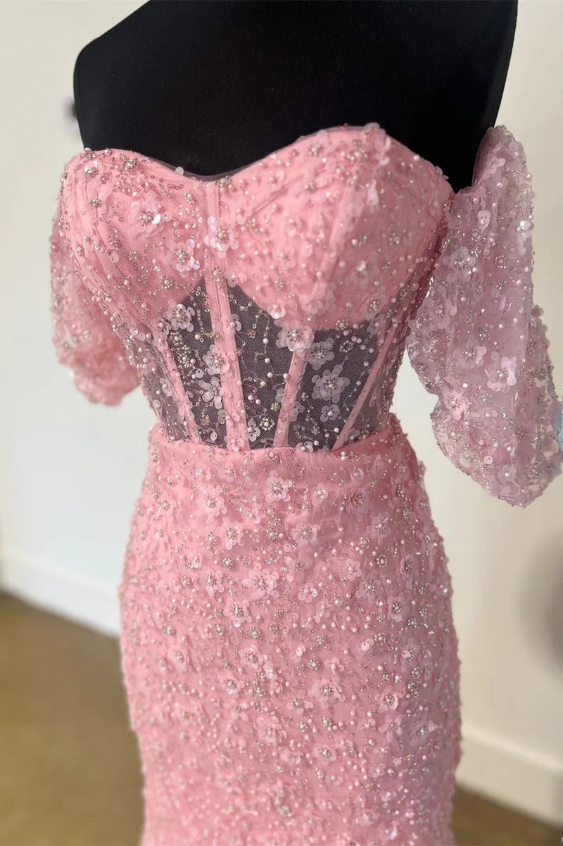Close-up of the intricate 3D floral lace details on the sweetheart mermaid dress.