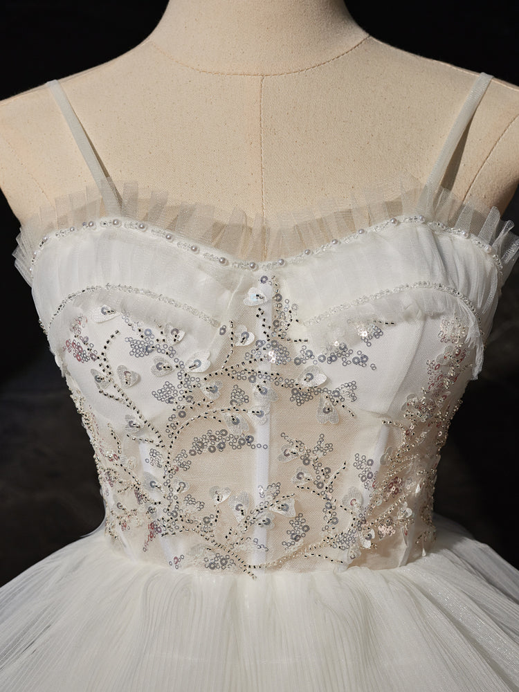 Side view of the high low hem on the formal gown.
