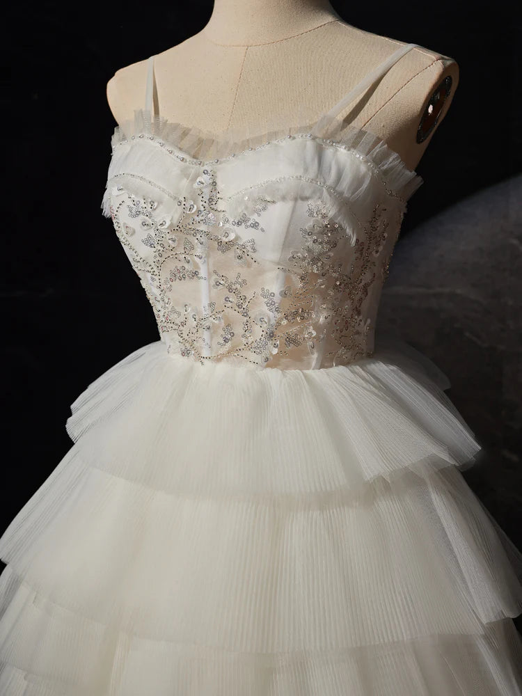 Back view of the sleeveless high low prom dress.