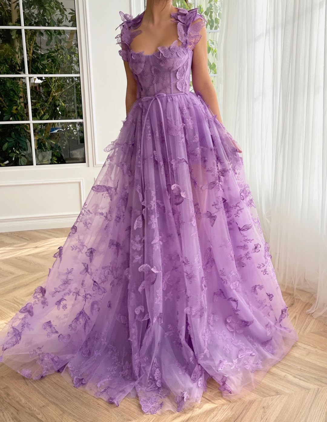 Full length view of the pink formal dress with 3D butterflies.