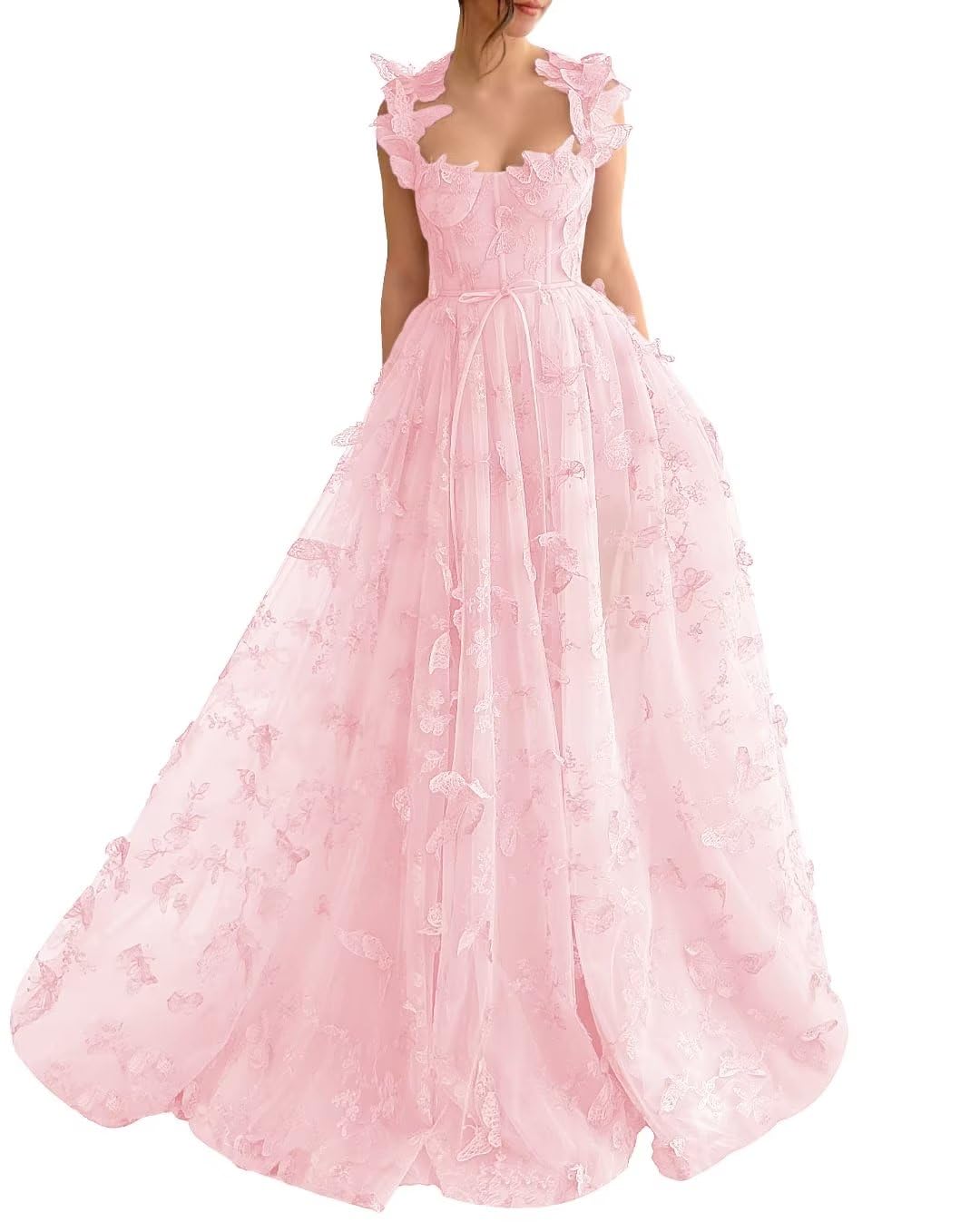Pink tulle prom dress with 3D butterflies and a side slit.