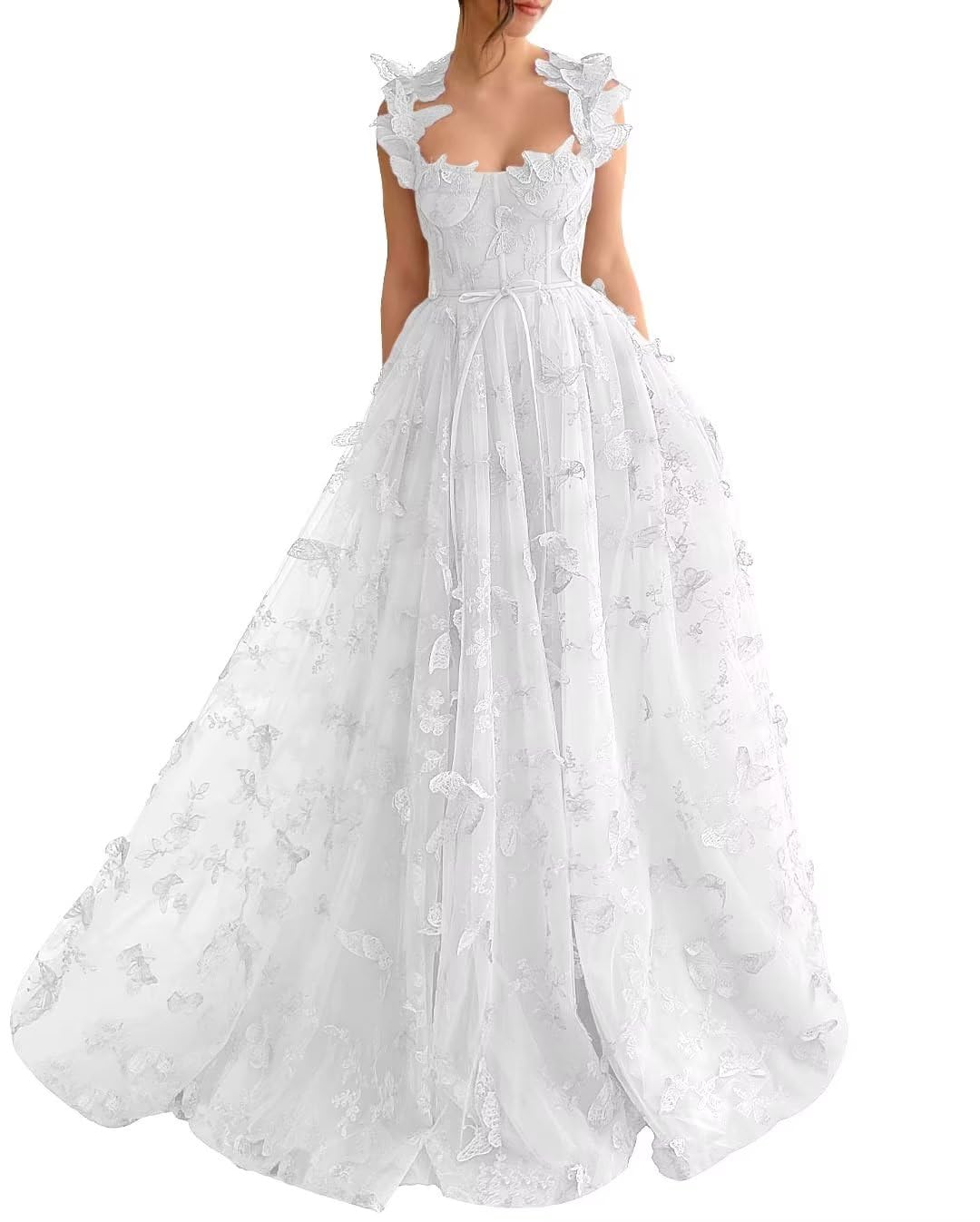 White tulle prom dress with 3D butterflies and a side slit.