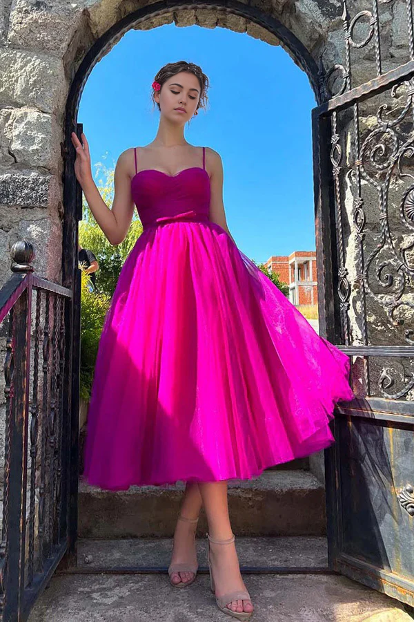 Hot pink tea length A-line prom dress.
