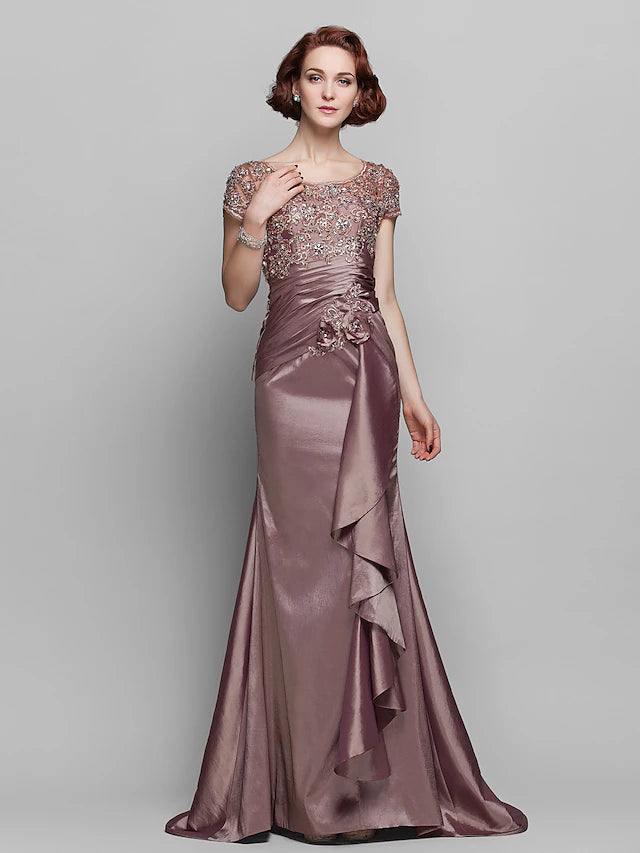 Elegant mermaid trumpet mother of the bride dress with beaded lace and short sleeves.