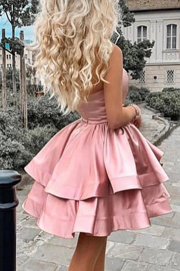 Elegant mini formal dress with tiered skirt.