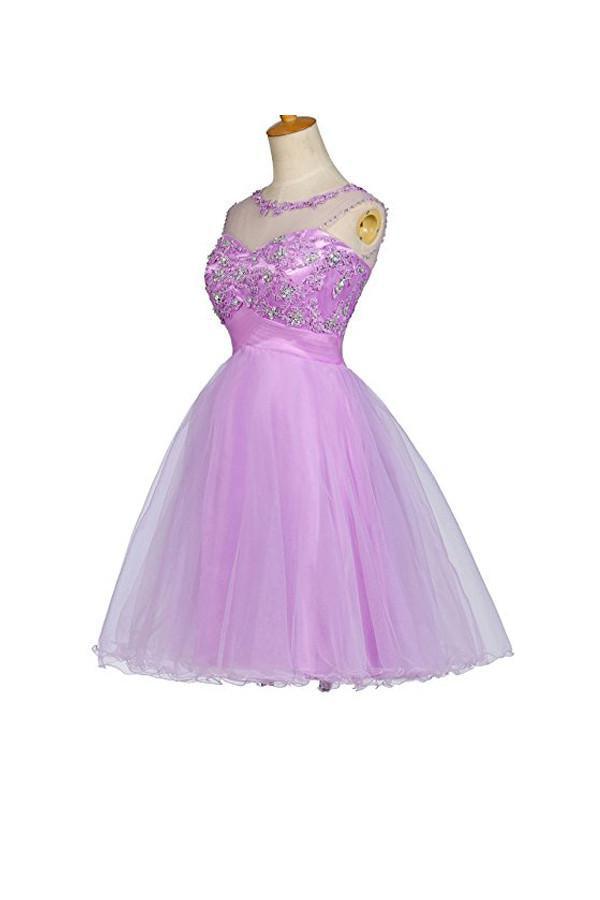 Side profile of the short beaded tulle dress, showcasing its silhouette.