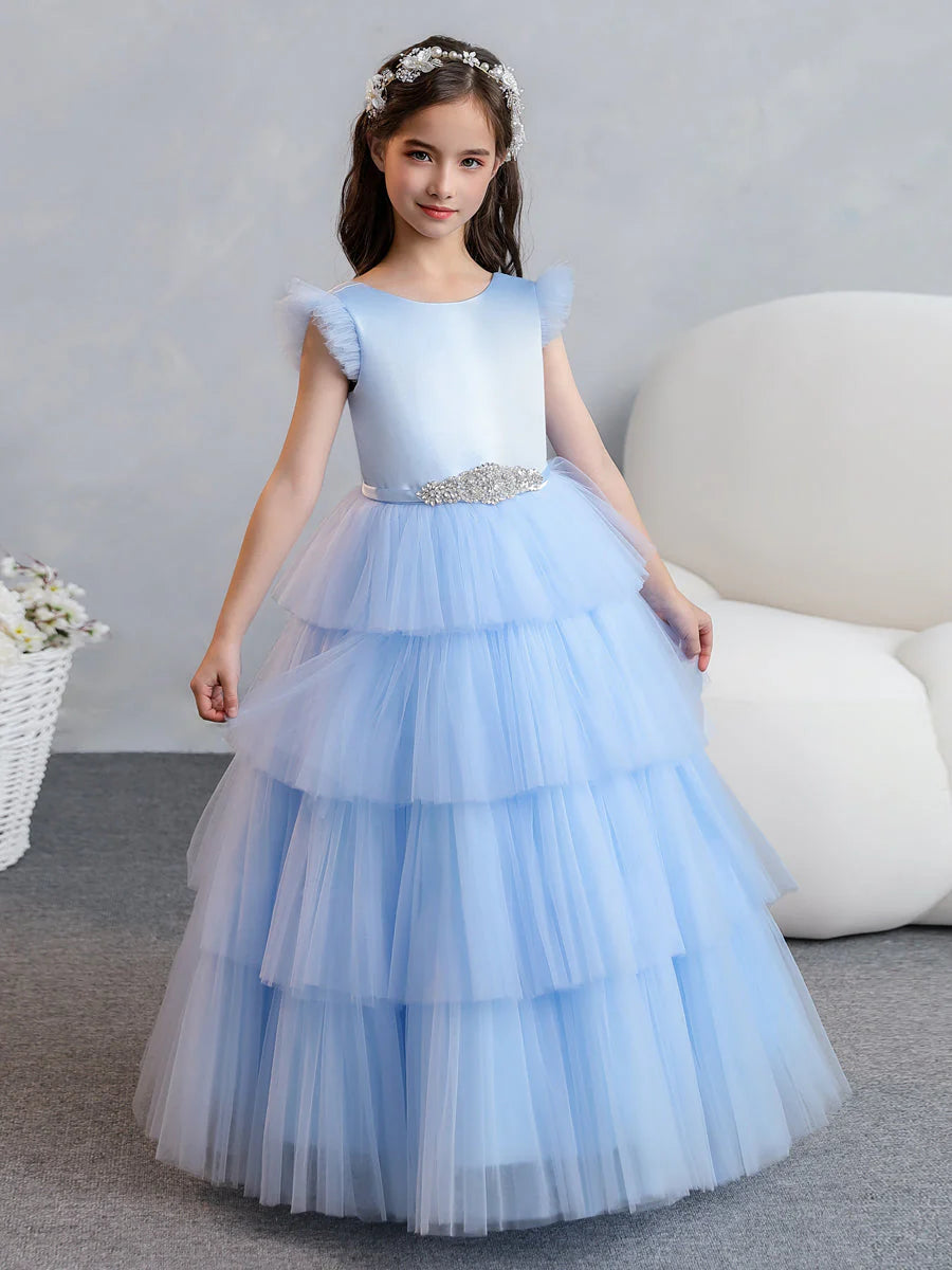 Elegant tulle ball gown flower girl dress with tiered pleats and rhinestones.