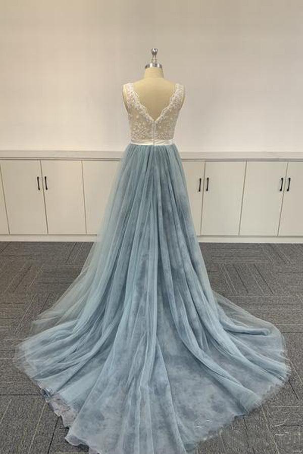 Back view of a sleeveless formal gown with delicate lace details.