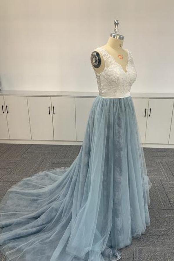 Side profile of a long tulle dress, perfect for special occasions.