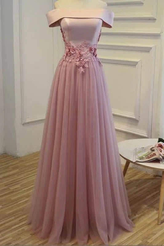 Long tulle off-shoulder gown with appliques, suitable for prom or formal events.