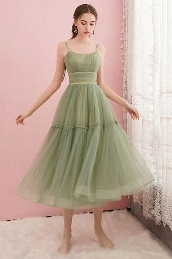 Sage green tulle A-line dress with a round neck.