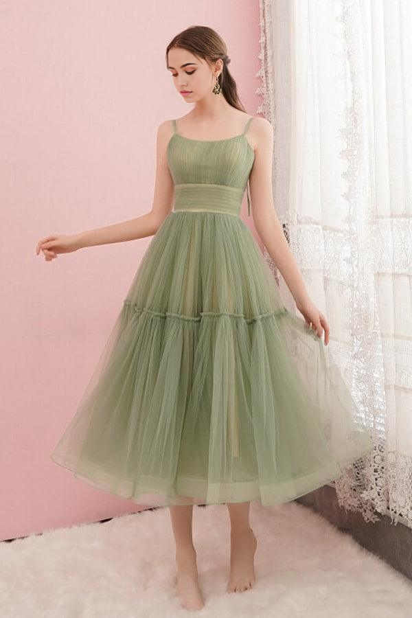Back view of a sage green graduation dress.