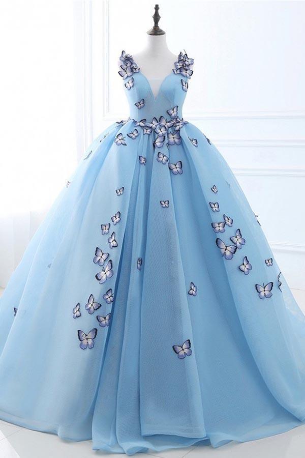 Elegant white tulle maxi gown with sweetheart neckline and butterfly appliques.