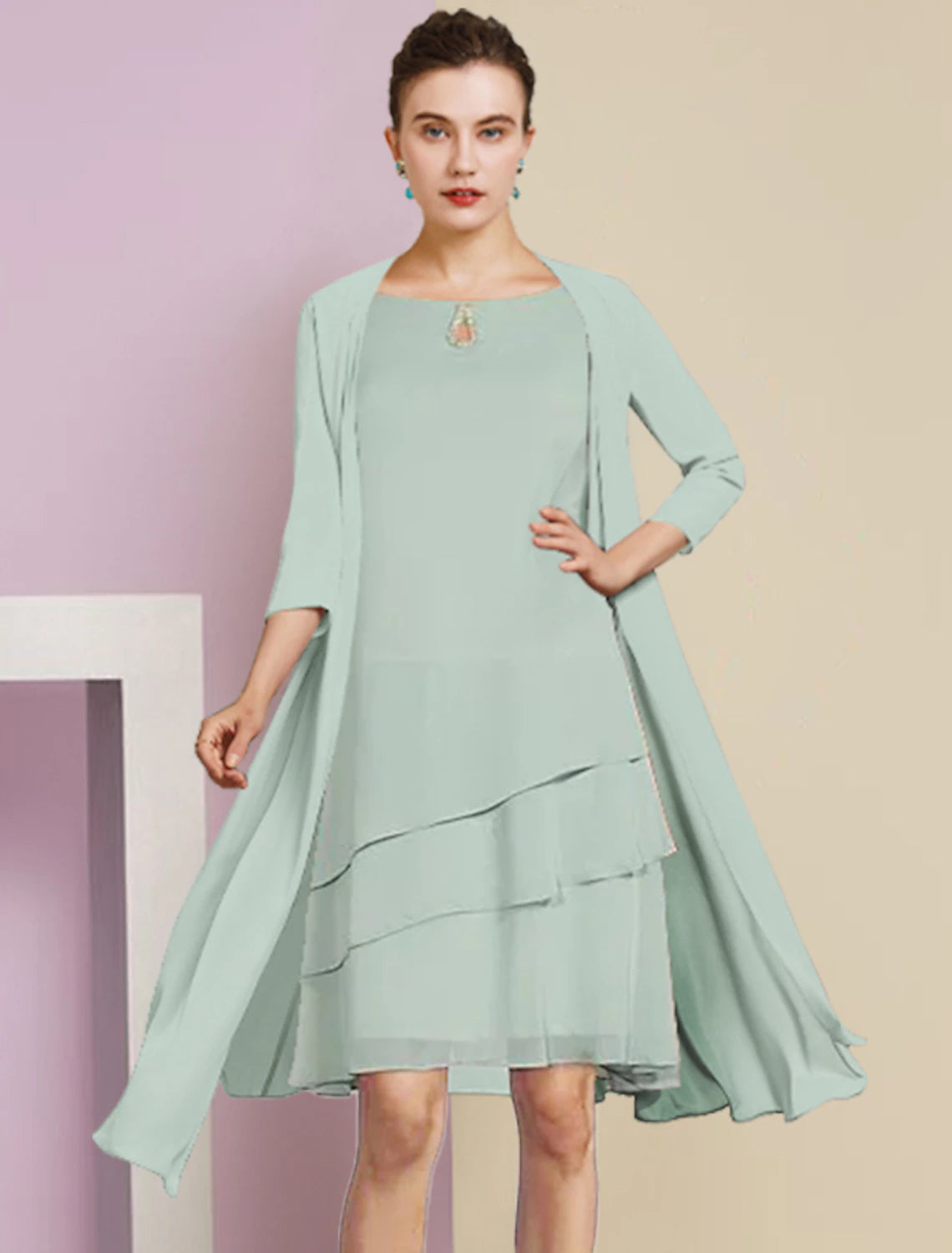 Full length view of the elegant two-piece Mother of the Bride dress.