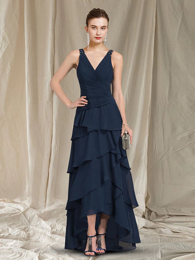 Close-up of the chiffon fabric and ruched ruffle details on the two-piece dress.