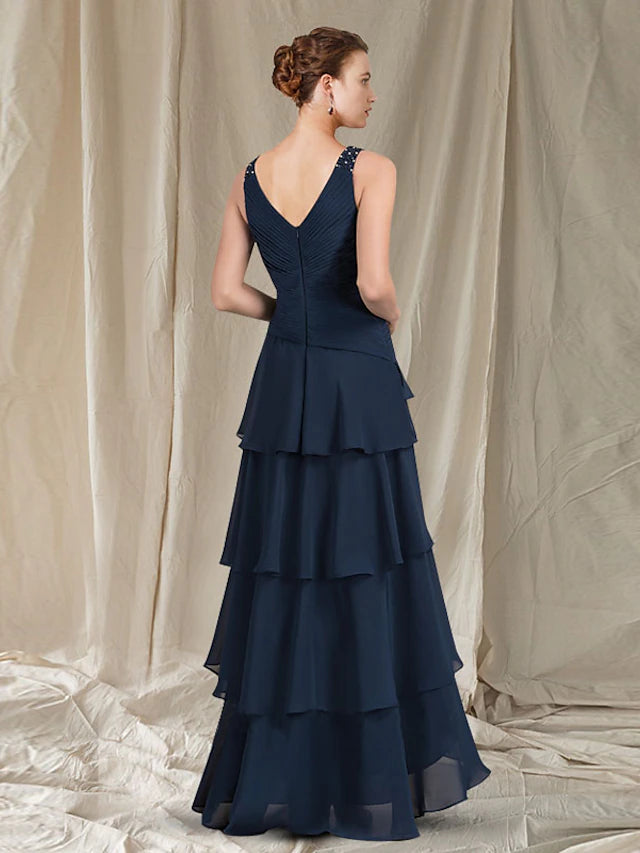 Side view of the elegant A-line Mother of the Bride dress, showcasing its flow.