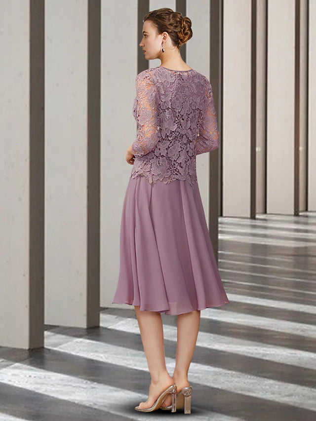 Back view of a sleeveless knee-length chiffon and lace dress.