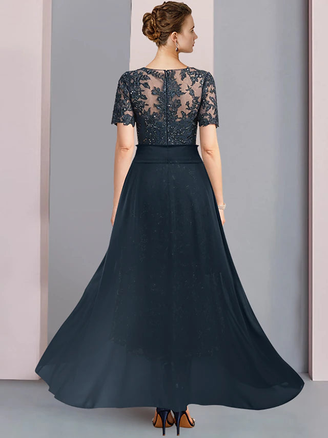Back view of the tea length mother of the bride dress showcasing lace details.