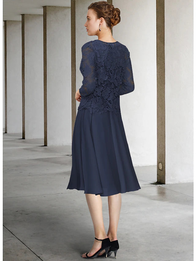 Close-up of the chiffon lace fabric and bow appliques on the mother of the bride dress.