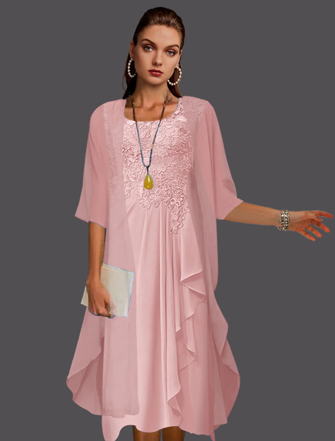 Back view of the elegant two-piece A-line dress with lace jacket.