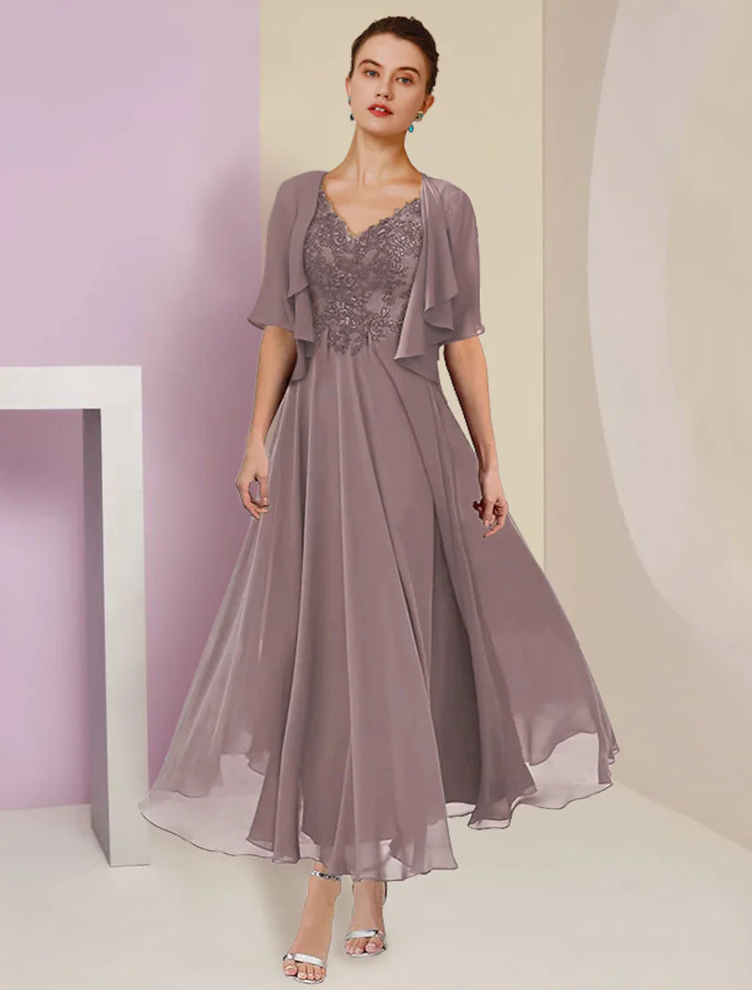 Elegant two-piece A-line Mother of the Bride dress with short sleeve jacket.
