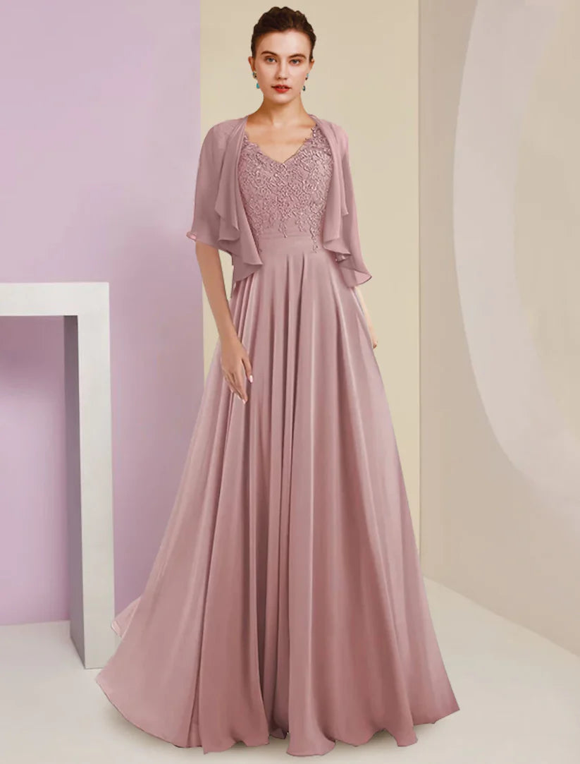 Woman wearing an elegant two-piece A-line Mother of the Bride dress with V-neck, 3/4 sleeves, lace, and chiffon.