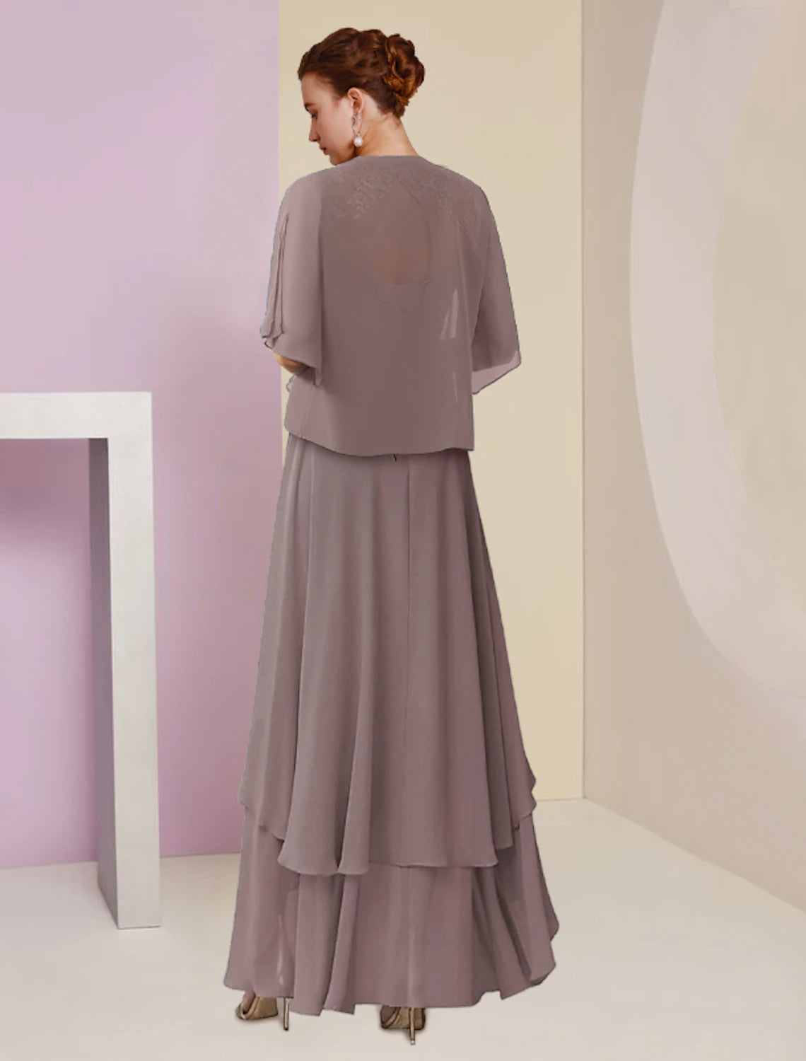 Detail of the ruched tier appliques on the elegant two-piece dress.