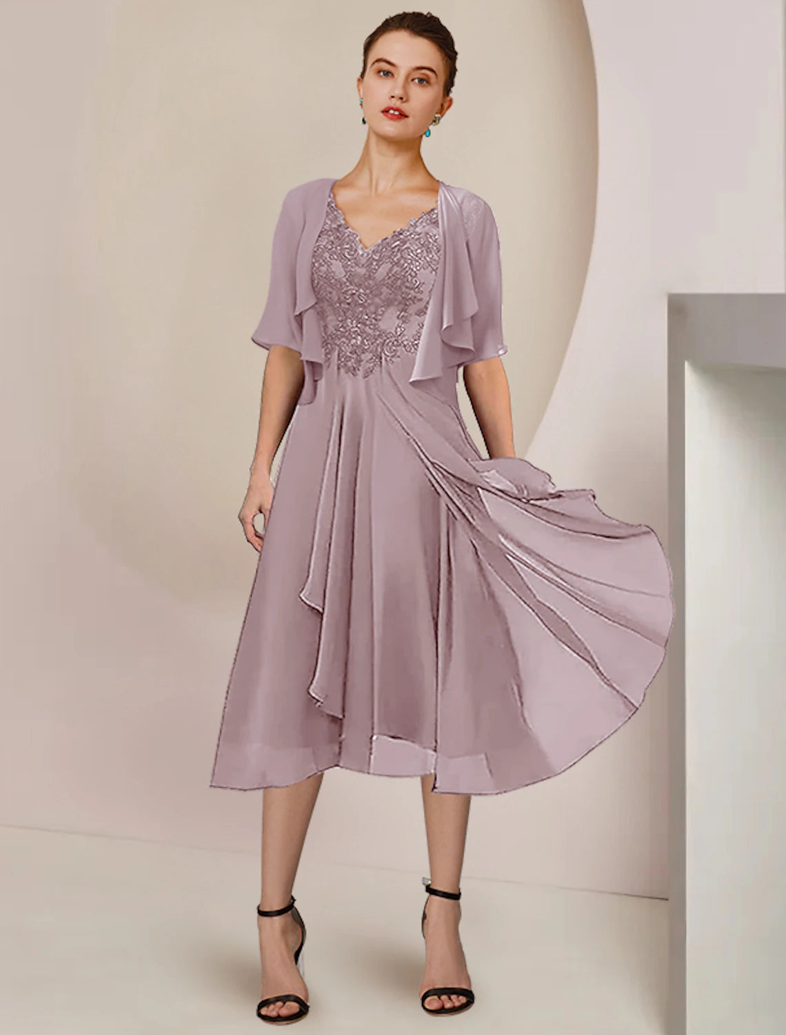 Elegant two-piece A-line mother of the bride dress with V-neck and short sleeves.