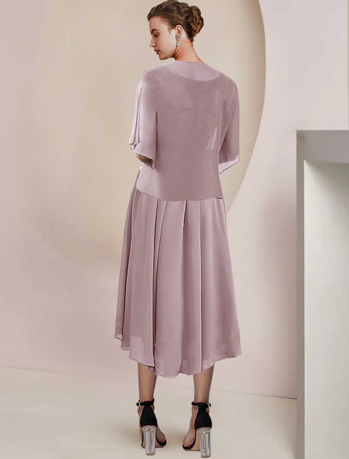 Side view of the asymmetrical tea-length dress with a matching wrap.