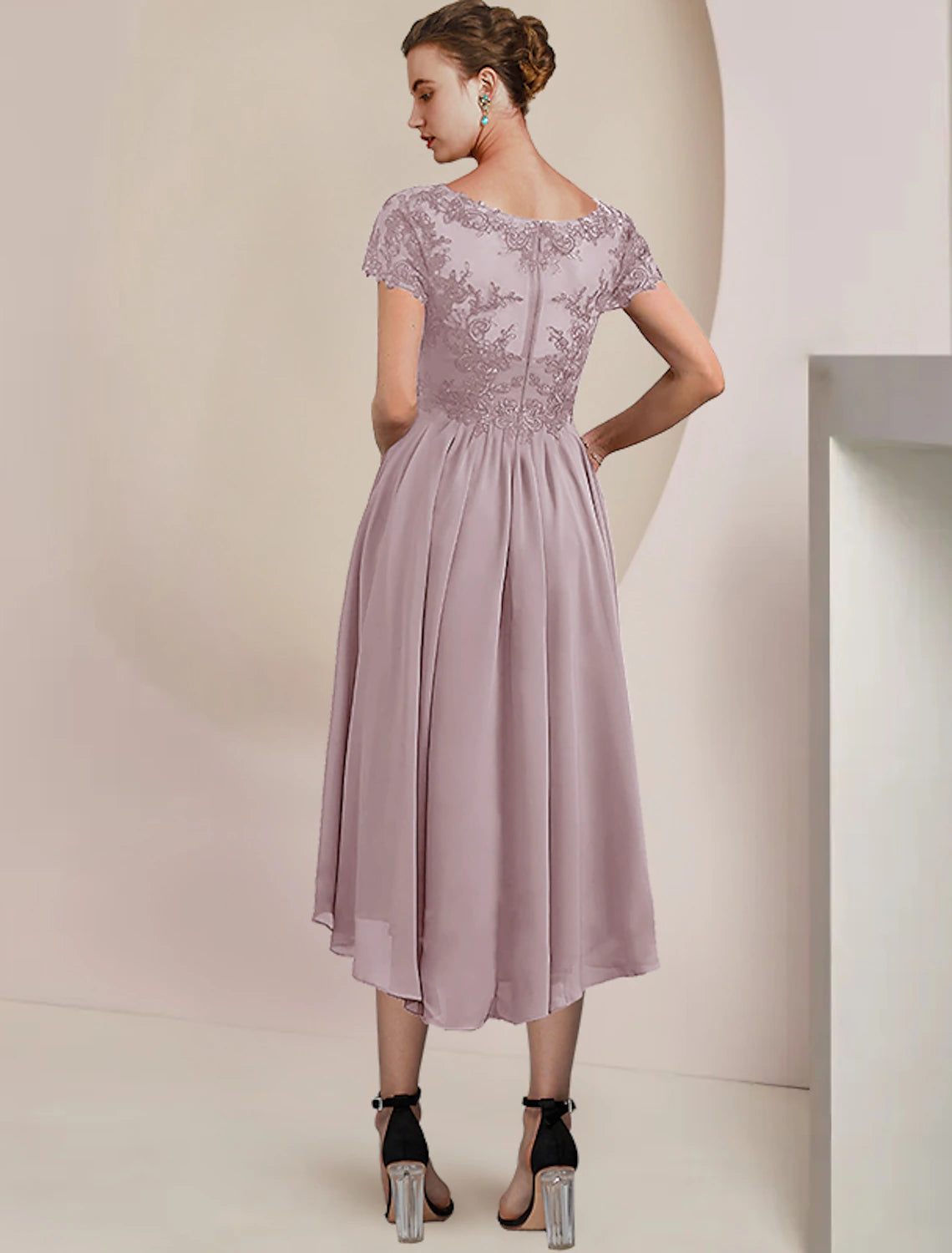 Full length view of the two-piece dress, highlighting the tea length.