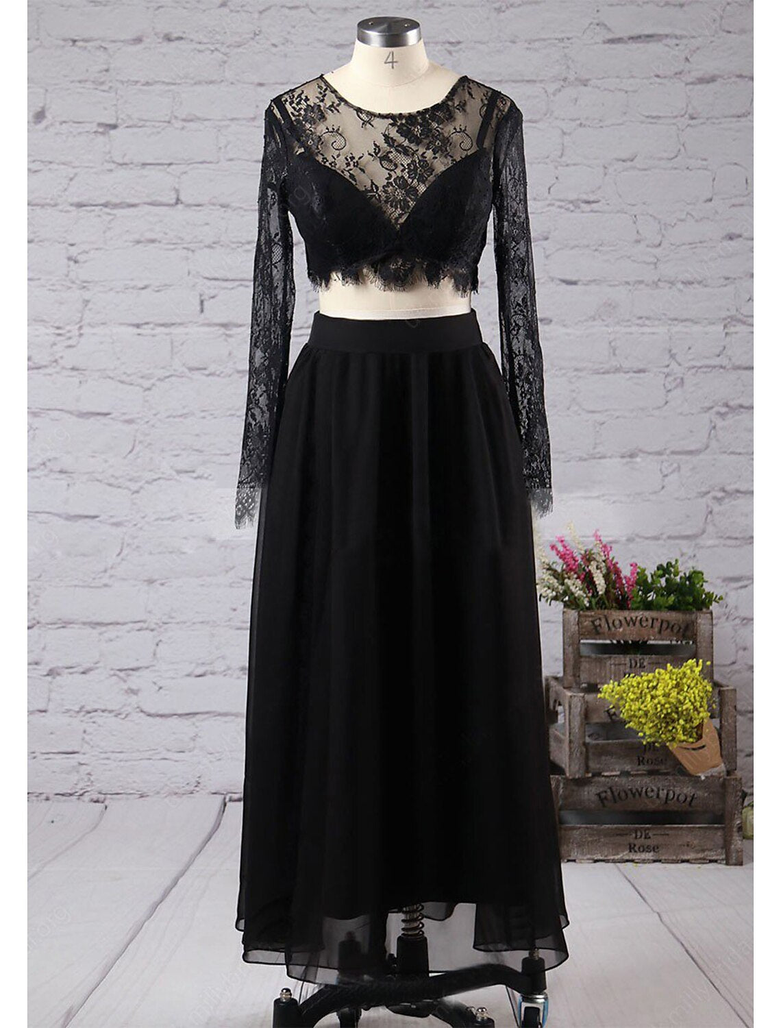 Elegant two-piece A-line prom dress with long sleeves and jewel neck.