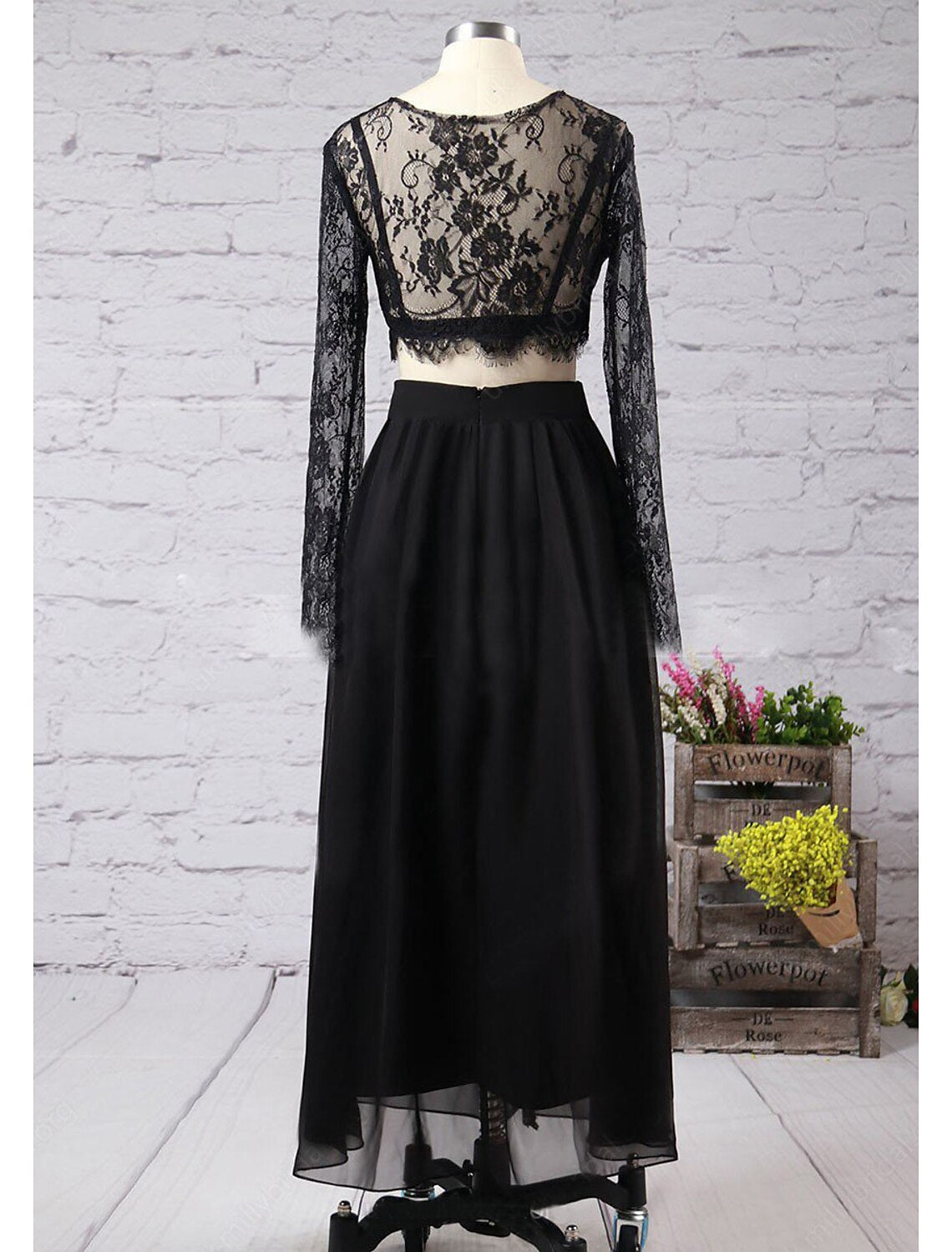 Two-piece A-line prom dress with long sleeves and jewel neck.