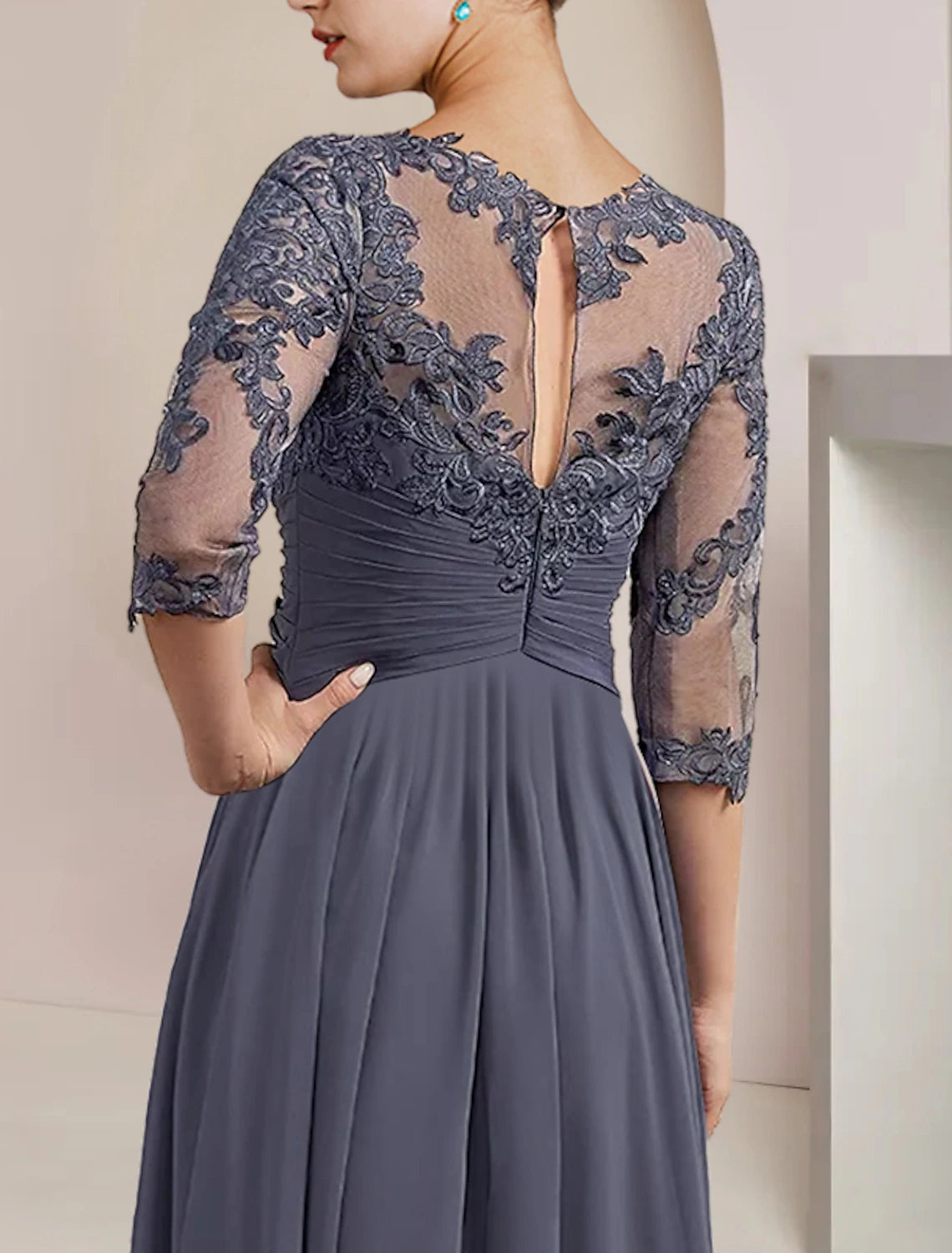 Side view of the two-piece A-line dress, showing its flowing silhouette.