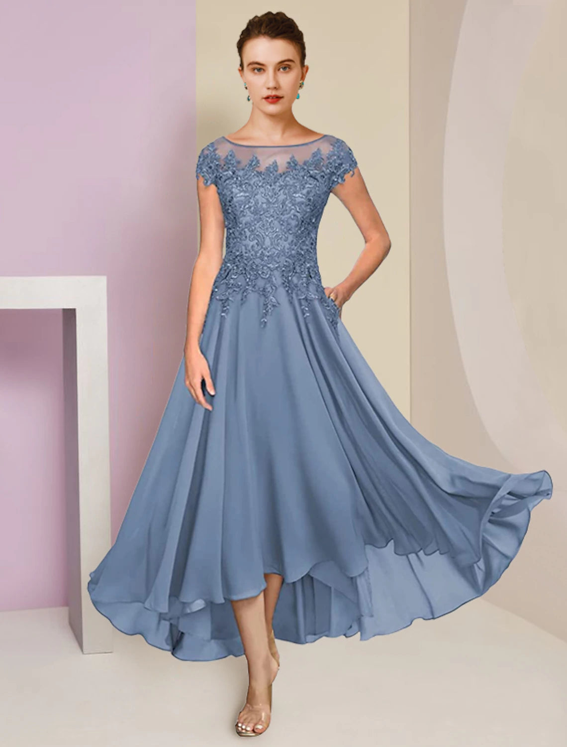 Formal tea-length chiffon lace dress featuring a high-low asymmetrical hem and included wrap.